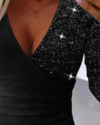 Overlaptop with contrasting sequins and ruffles
