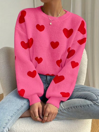 Sara | Pull rose avec motif de cœur rouge et col rond