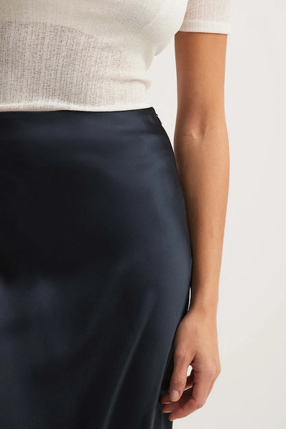 Ladies Glamorous Midi Skirt with High Waist and Shiny Fabric