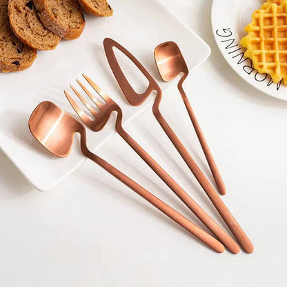 Luxuriöses Besteckset aus Edelstahl mit ausgeschnittenem Skelettdesign - zeitgemäßes Design - außergewöhnliche Stabilität