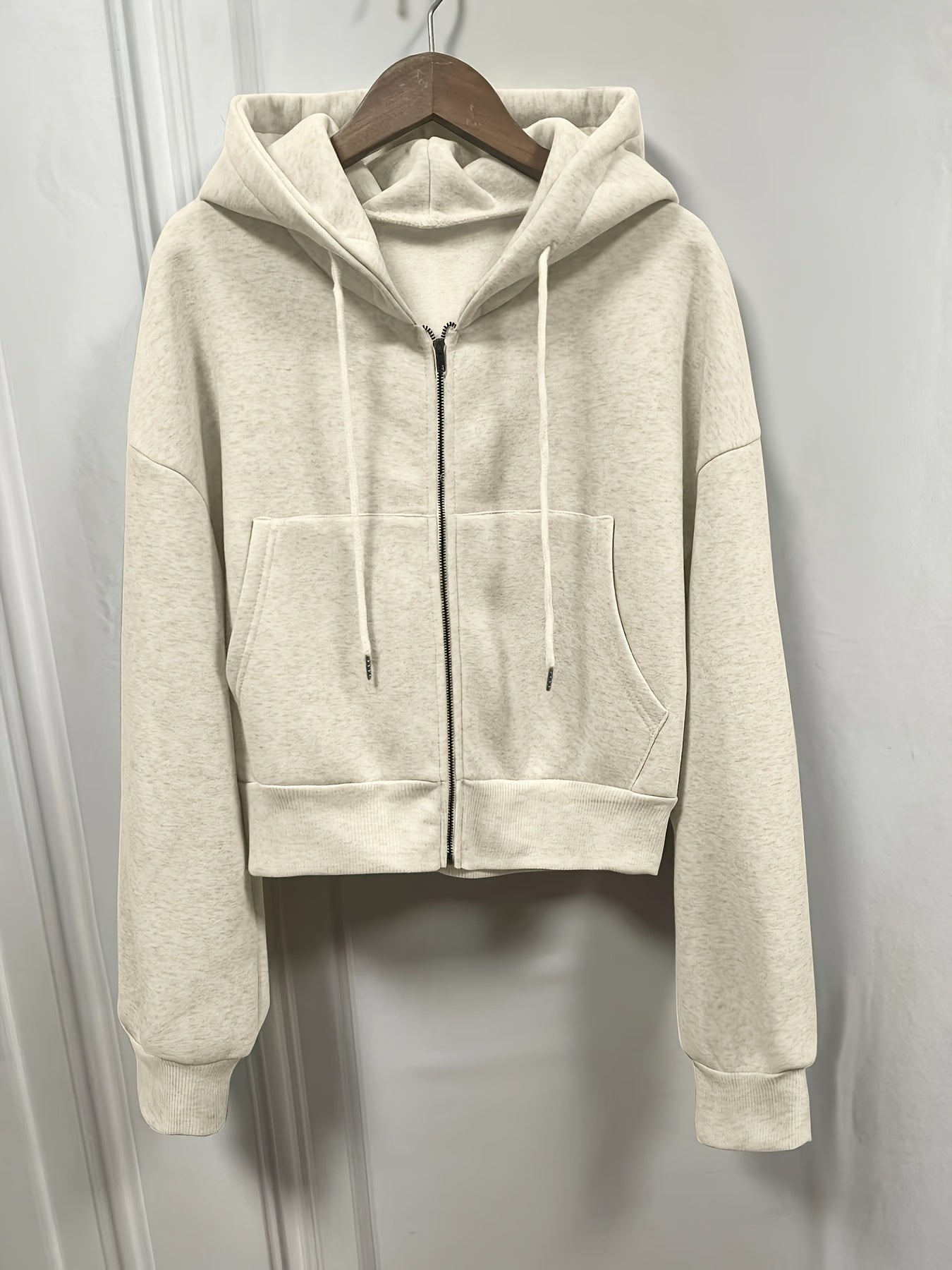 Sophie | Sweat à capuche uni avec zip et cordon de serrage