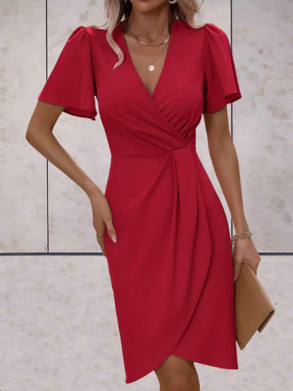 Sophie | Robe ajustée avec col en V et effet portefeuille
